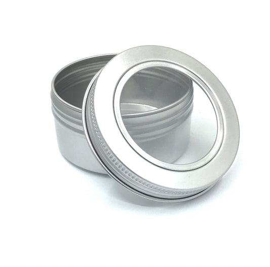 Klein rond theeblikje met venster en schroefdeksel