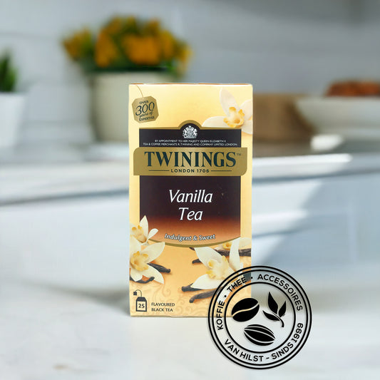 Twinings Vanilla Tea - In een lichte witte keuken met oranje bloemen op het aanrecht.