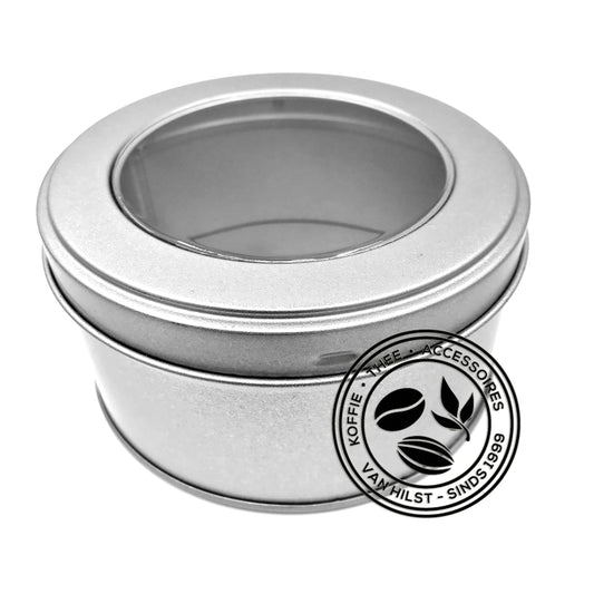 Rond theeblik met venster